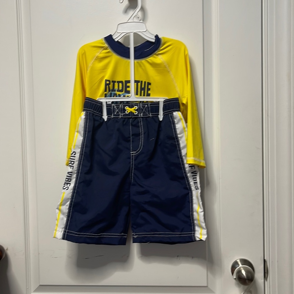swim trunks and shirt set